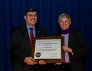 Jan McGarry aceeppting an individual Robert H. Goddard award for Exception Achievement for Engineering